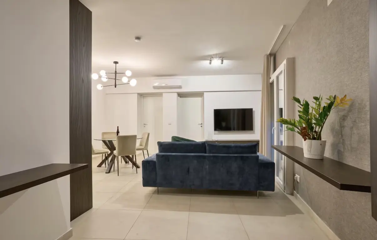 Open-plan living area of the furnished 2 bedroom apartment near Balluta Bay, St Julian's